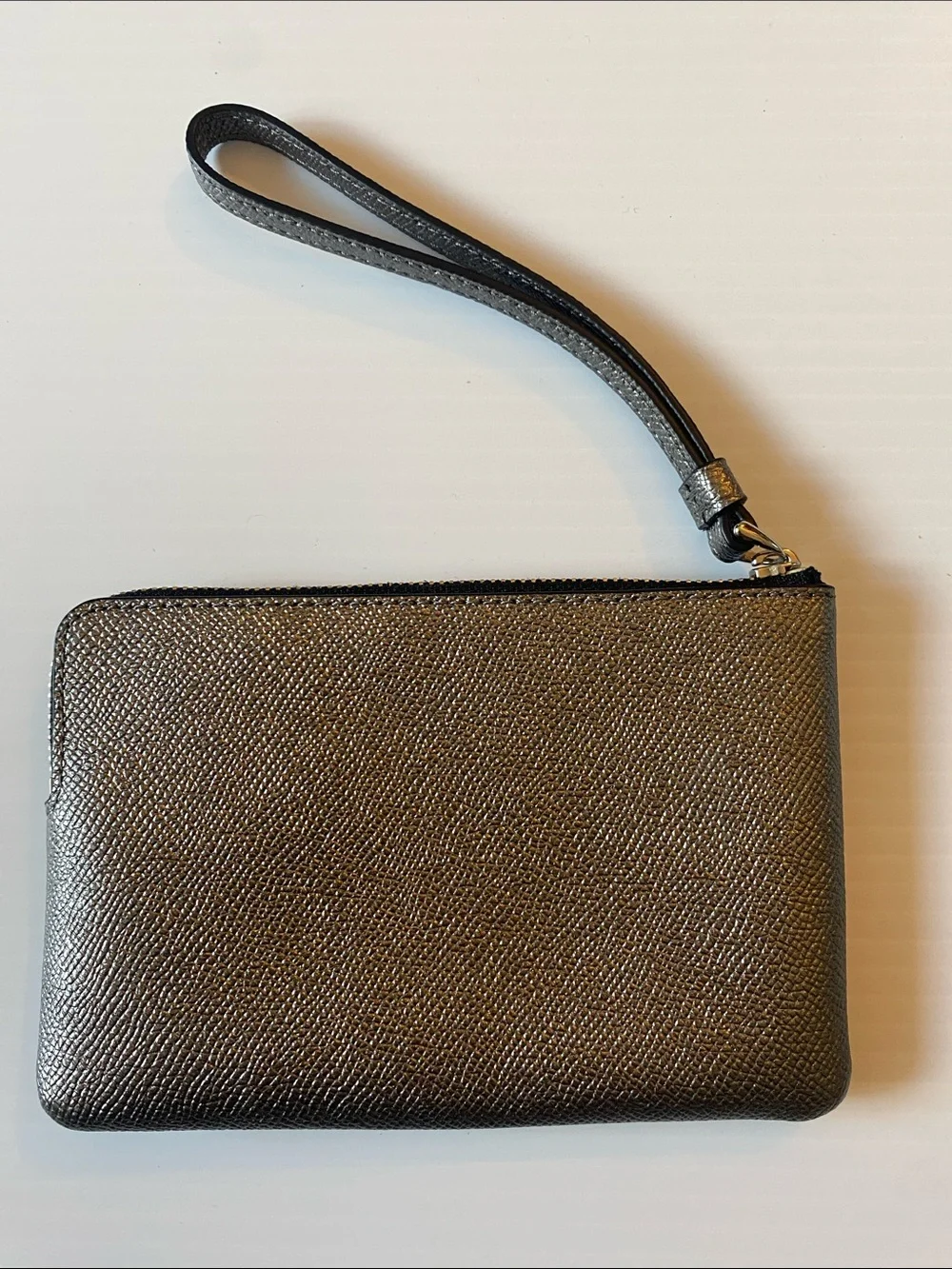 Coach Corner Zip Leather Wristlet in Silver and Black. F21070
